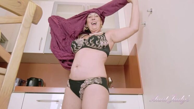 Brunette Esmerelda Undresses and Plays in the Kitchen